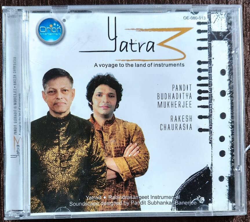 Pandit Budhaditya Mukherjee & Rakesh Chaurasia - Yatra 3 - A Voyage To The Land Of Instruments (2013) Pt. Subhankar Banerjee Pre-Owned Orion Entertainment Audio CD
