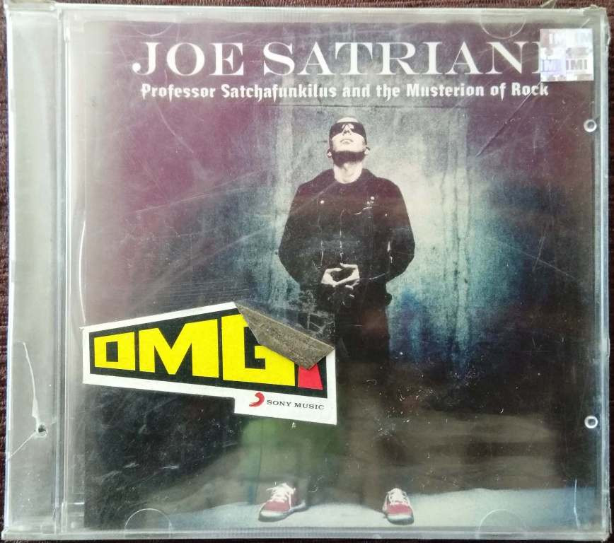 Joe Satriani ‎– Professor Satchafunkilus And The Musterion Of Rock (2008) Joe Satriani Pre-Owned Sony BMG Audio CD