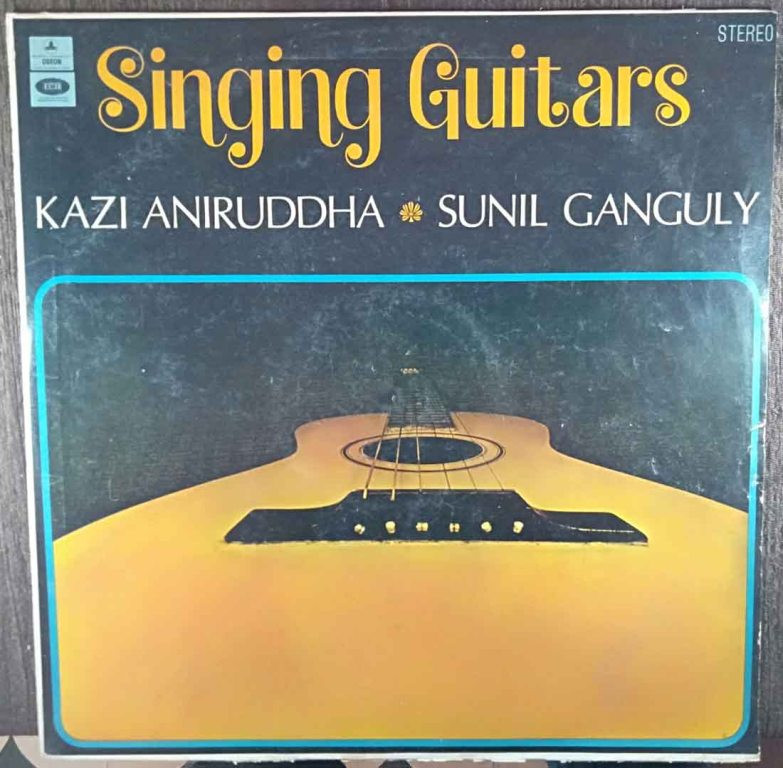 Kazi Aniruddha & Sunil Ganguly ‎– Singing Guitars (1973) Kazi Aniruddha & Sunil Ganguly Pre-Owned Vinyl, 12" LP Record