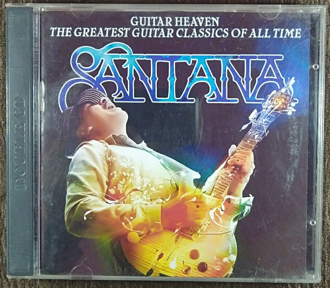 Santana – Guitar Heaven: The Greatest Guitar Classics Of All Time (2010) Carlos Santana Pre-Owned Sony Music, Artista Records Double Audio CD & DVD