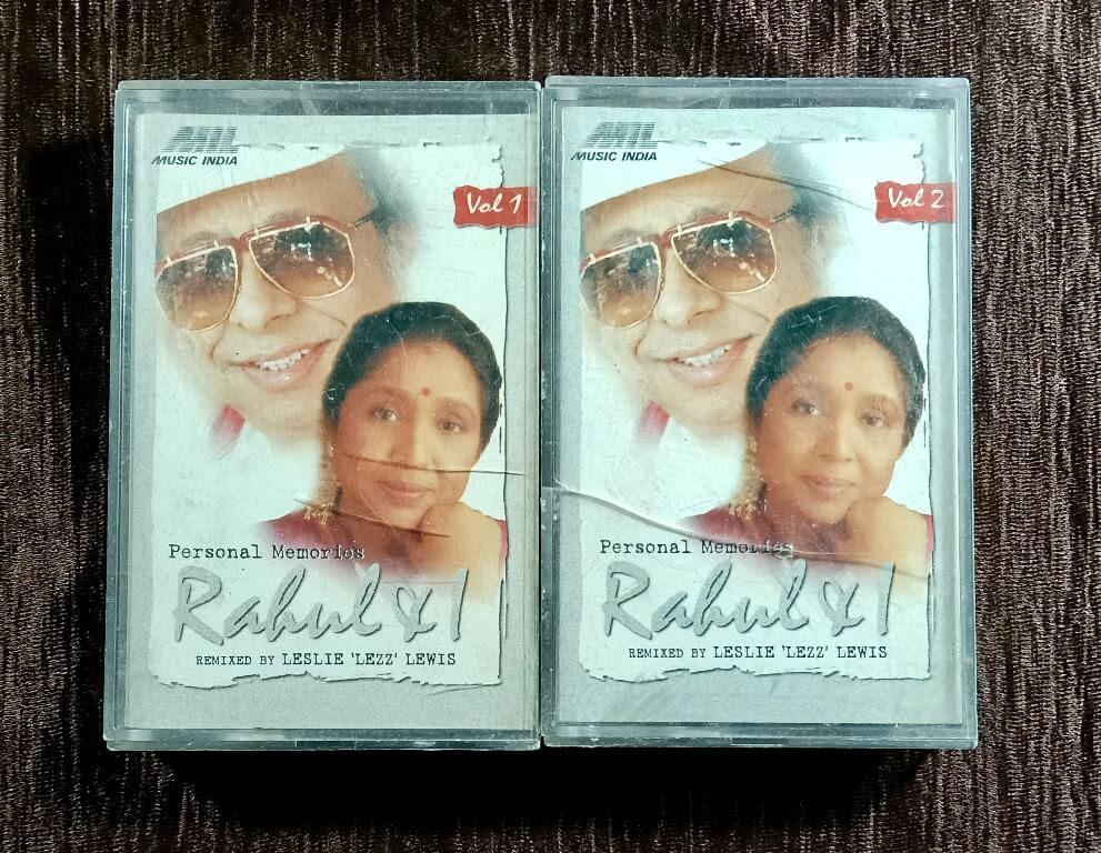 Rahul & I (Personal Memories) Vol. 1 & 2 (1996) Music RD. Burman, Remixed By – Leslie 'Lezz' Lewis & Singer – Asha Bhosle, Rahul Pre-Owned Music India – PolyGram Imported Double Audio Cassette Set