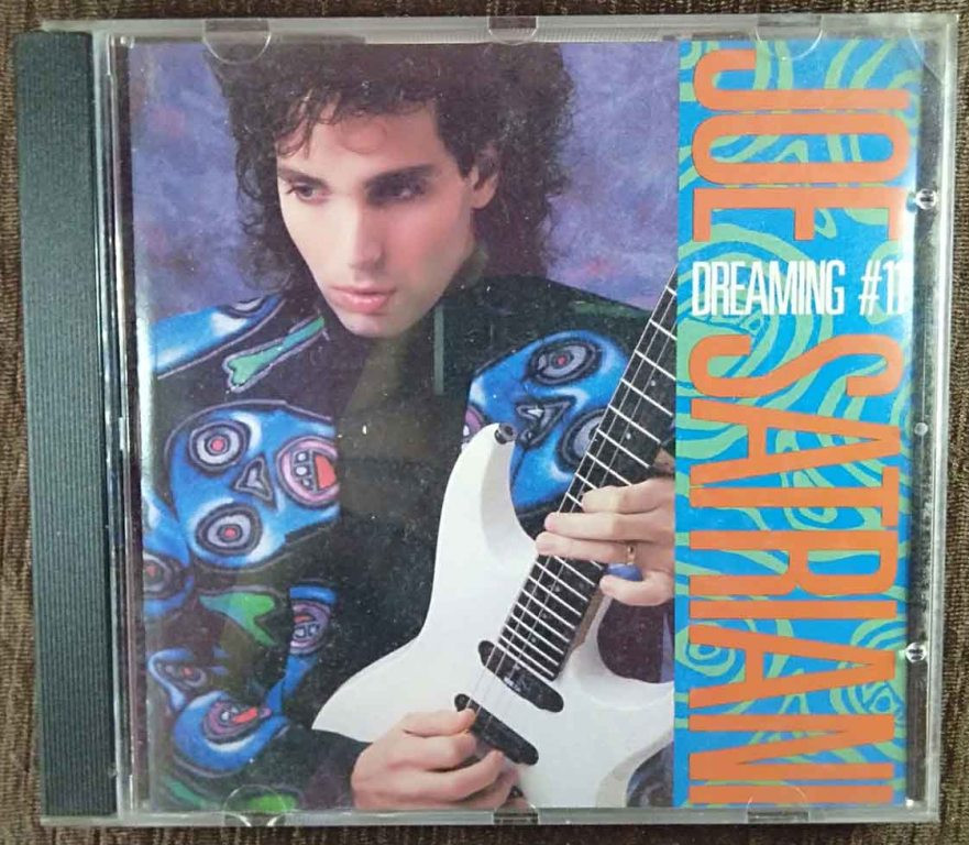 Joe Satriani - Dreaming 11# (1988) Joe Satriani Pre-Owned Relativity Records Audio CD